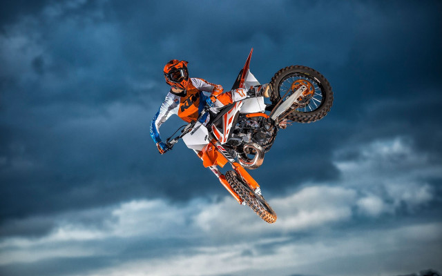 Motorcycle trick air cloudy dark free wallpaper for desktop - medium preview image