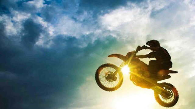 Dirt bike air sun clouds free wallpaper for desktop - medium preview image