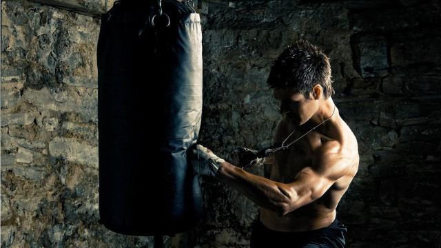Man boxing practice gym punching free wallpaper for desktop - medium preview image