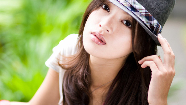 Woman hat posing picture hand free wallpaper for desktop - medium preview image
