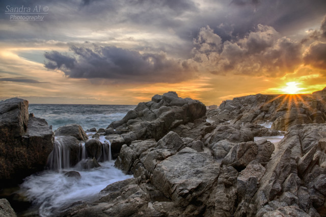 Rocky beach waterfall sunset cloudy #2 free wallpaper for desktop - medium preview image