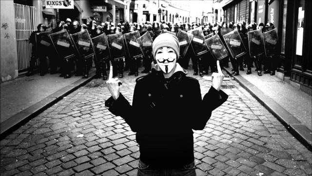 Masked person crowd flags banners free wallpaper for desktop - medium preview image