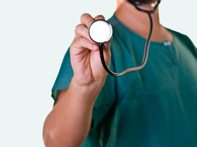 Man green shirt stethoscope holding free wallpaper for desktop - medium preview image