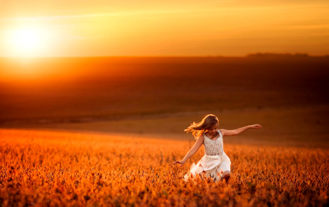 Woman field arms outstretched sunset free wallpaper for desktop - medium preview image
