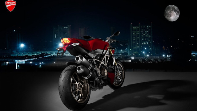 Red motorcycle city night moon free wallpaper for desktop - medium preview image