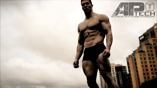 Muscular man city skyline tall free wallpaper for desktop - medium preview image