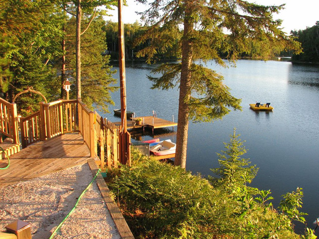 Dock boat rowboat lake trees free wallpaper for desktop - medium preview image