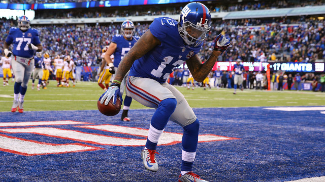 Football player running field ball free wallpaper for desktop - medium preview image