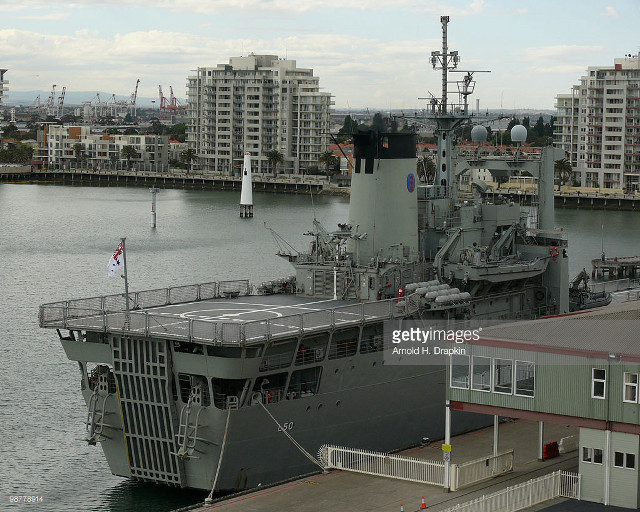Large ship docked harbor city #2 free wallpaper for desktop - medium preview image