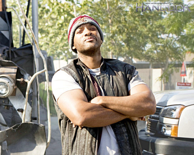 Man standing truck arms crossed free wallpaper for desktop - medium preview image