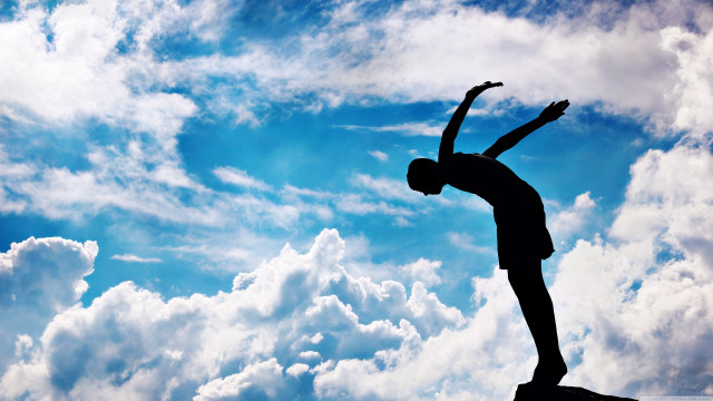 Person standing rock arms in free wallpaper for desktop - medium preview image