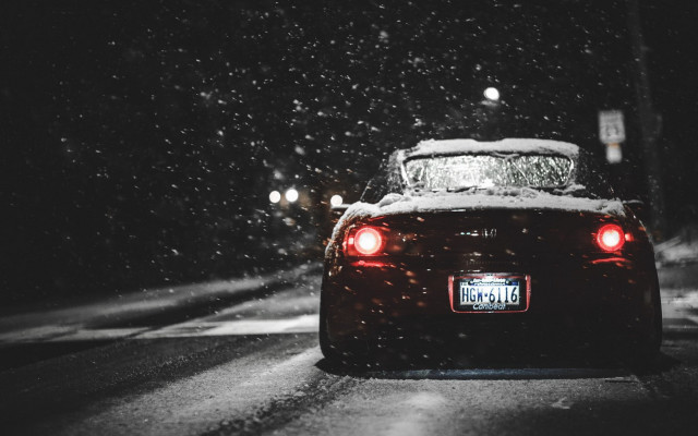 Car driving snowy street night free wallpaper for desktop - medium preview image