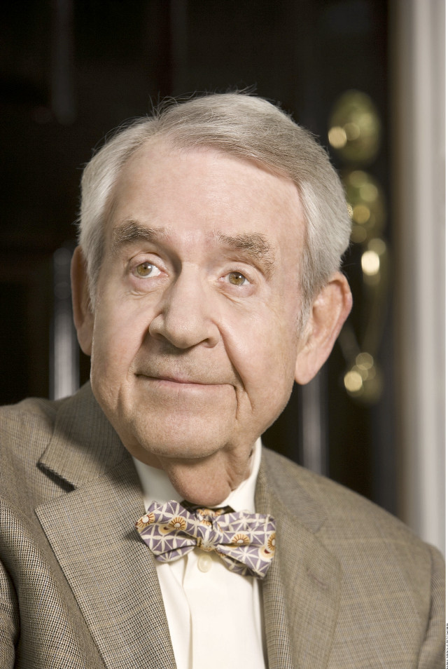 Man suit bowtie smiling camera free wallpaper for mobile - medium preview image