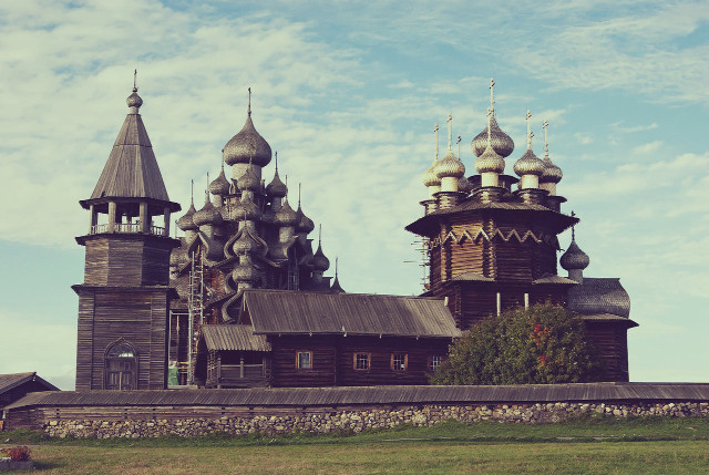 Wooden church clocktower spires grassy free wallpaper for desktop - medium preview image