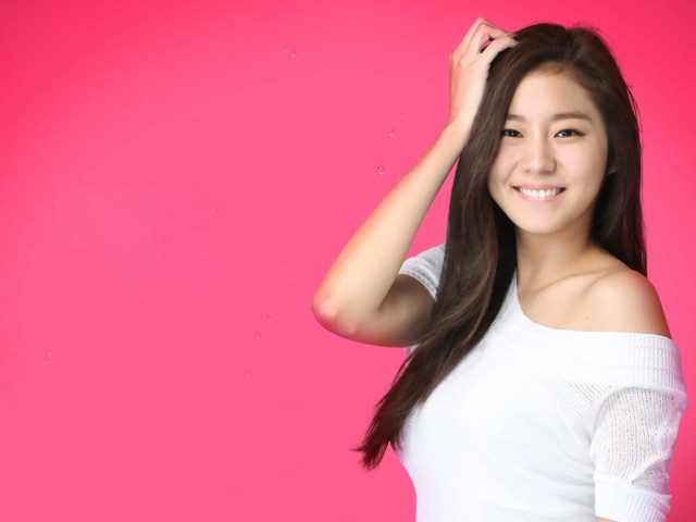 Woman pink background long hair free wallpaper for desktop - medium preview image