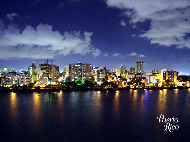 City skyline night water cloudy free wallpaper for desktop - medium preview image