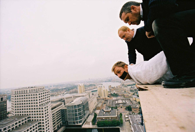 Two men suits cityscape ledged free wallpaper for desktop - medium preview image