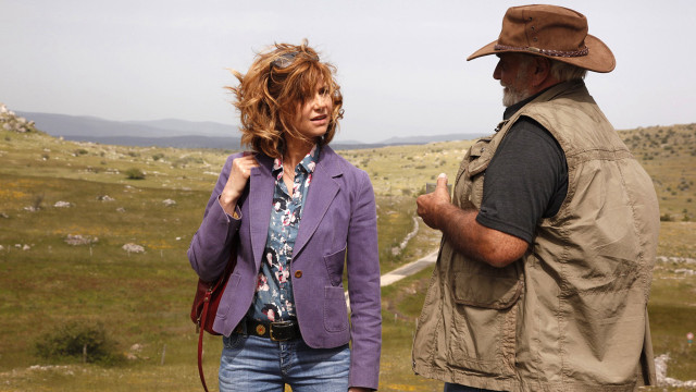 Man woman field grass rocks free wallpaper for desktop - medium preview image