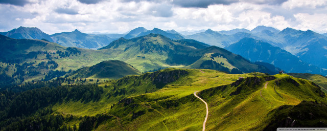 Winding road green mountains cloudy free wallpaper for desktop - medium preview image