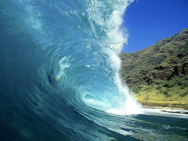 Large wave beach mountain person free wallpaper for desktop - medium preview image