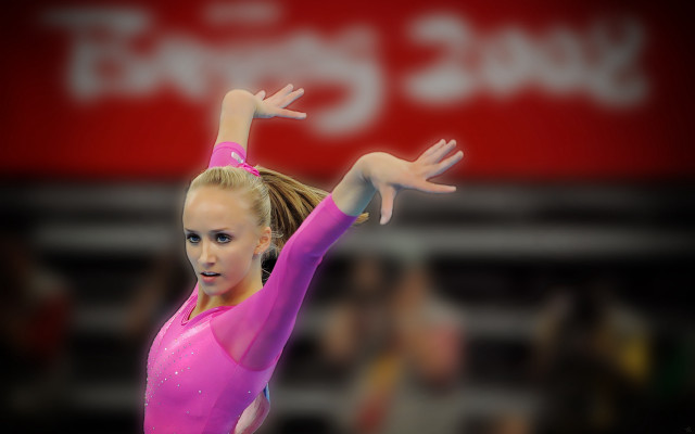 Woman pink leotard balance beam free wallpaper for desktop - medium preview image