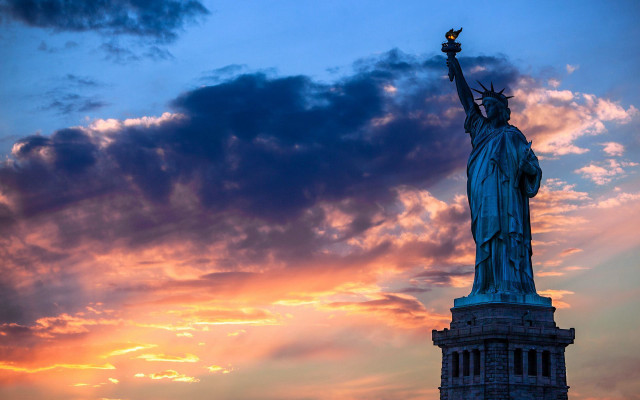 Statue liberty silhouette sunset sky free wallpaper for desktop - medium preview image