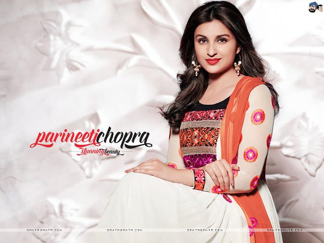 Woman orange dress white background free wallpaper for desktop - medium preview image