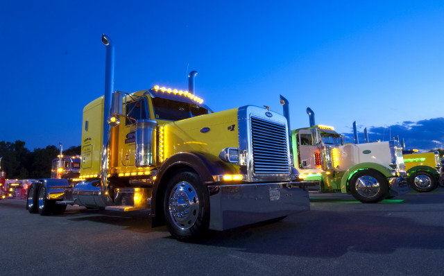 Yellow semi truck parking lot free wallpaper for desktop - medium preview image