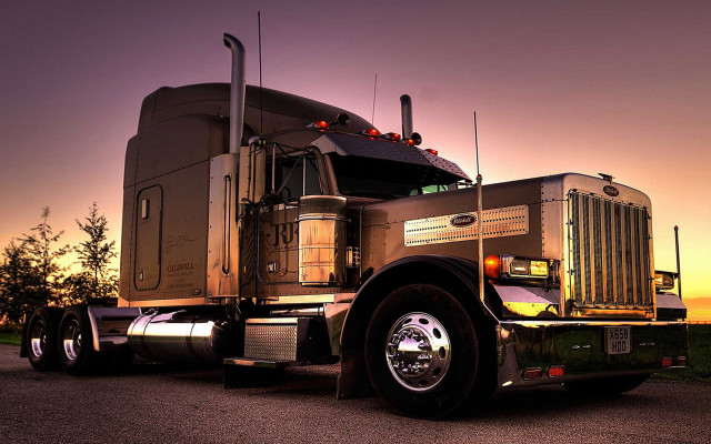 Semi truck sunset road photorealism free wallpaper for desktop - medium preview image