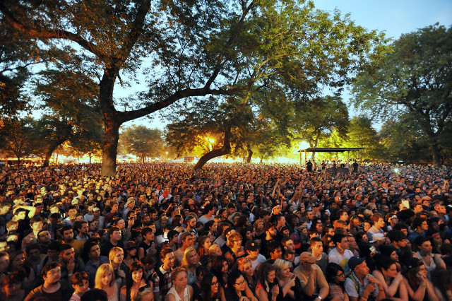 Crowd sitting trees concert festival free wallpaper for desktop - medium preview image
