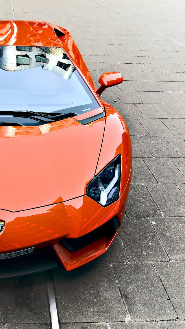Orange sports car parking lot #5 free wallpaper for mobile - medium preview image