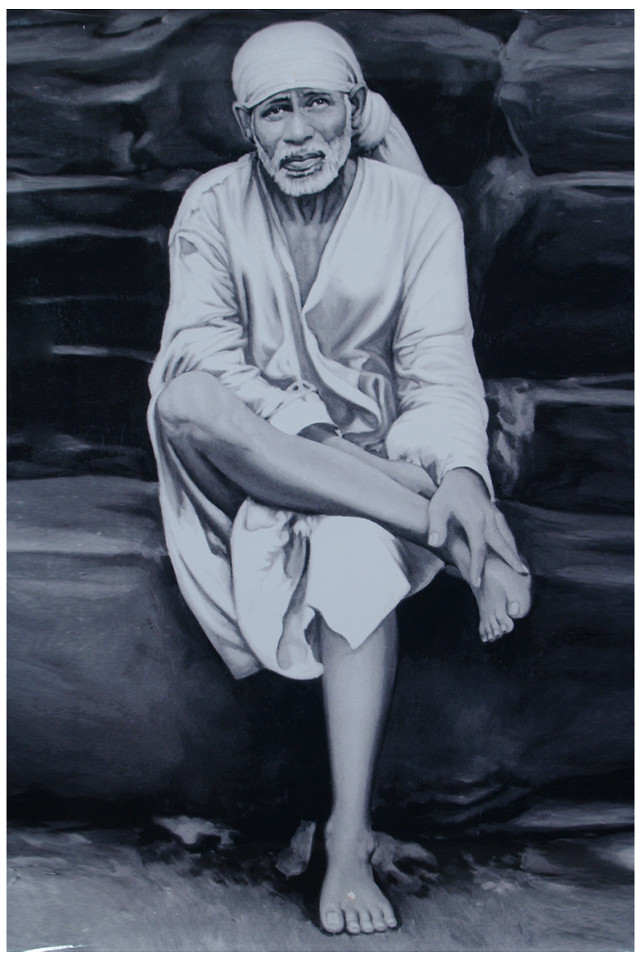 Man sitting rock legs crossed free wallpaper for mobile - medium preview image