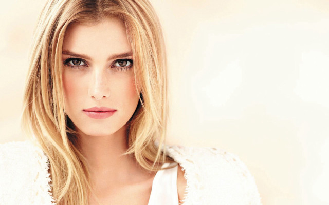 Blonde woman serious portrait naturalism #2 free wallpaper for desktop - medium preview image