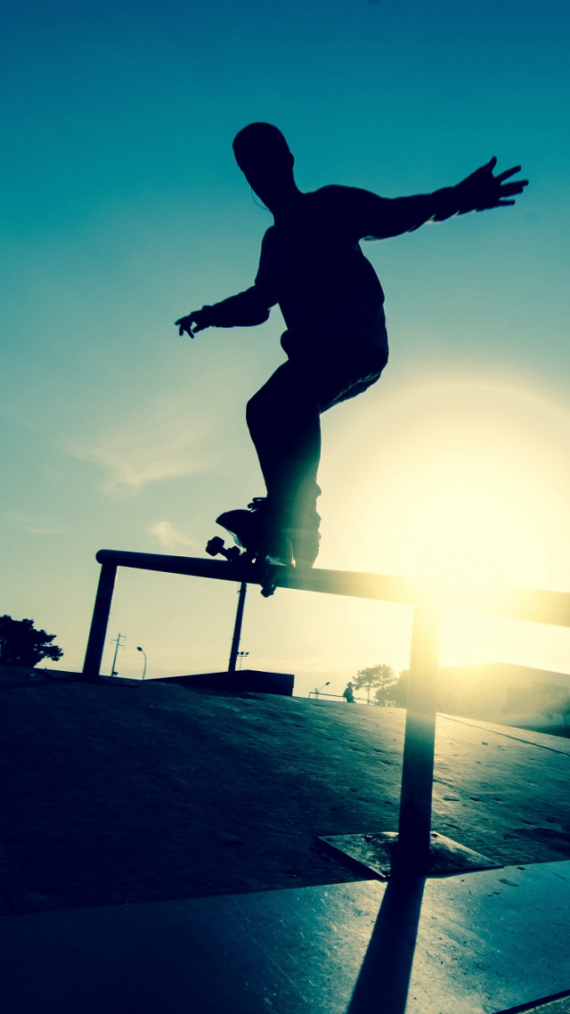 Skateboarder trick rail sunset sunrise #2 free wallpaper for mobile - medium preview image
