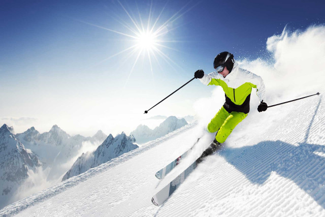 Skiing snowy mountain sunshine yellow free wallpaper for desktop - medium preview image