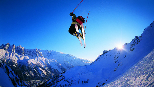 Skier air mountain range sun free wallpaper for desktop - medium preview image