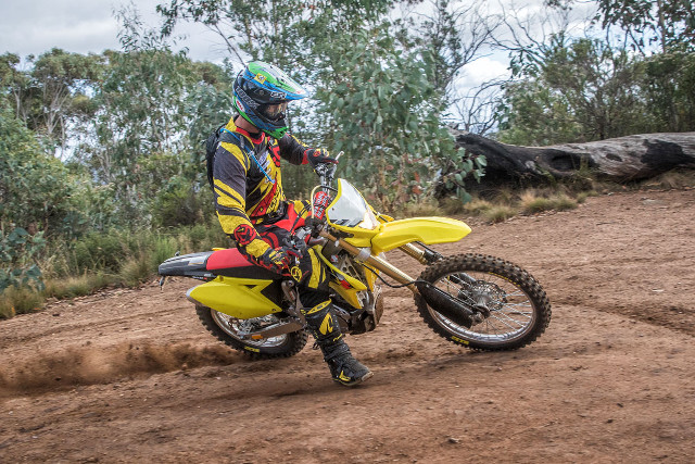 Man riding yellow dirt bike free wallpaper for desktop - medium preview image