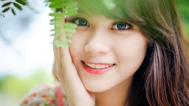 Woman green eyes leaf plant #2 free wallpaper for desktop - medium preview image