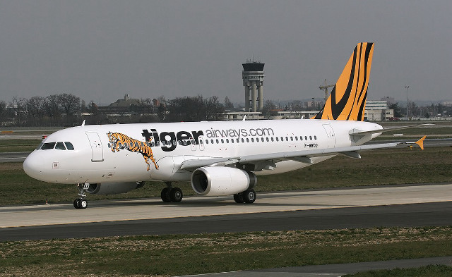 Tiger airlines plane runway airport free wallpaper for desktop - medium preview image