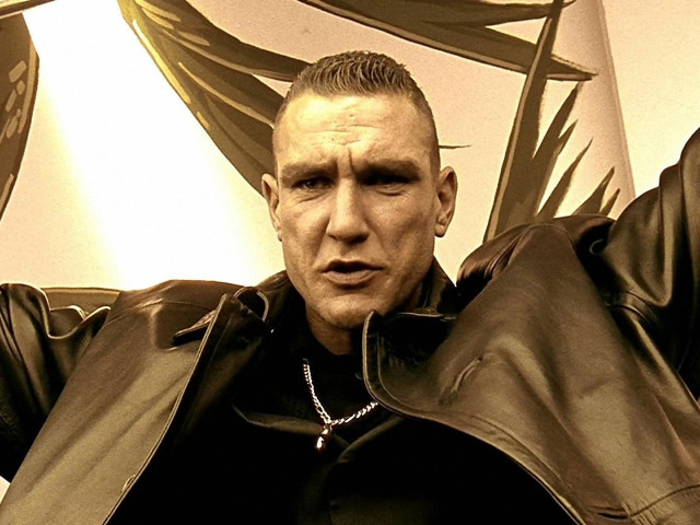 Man leather jacket raising arms free wallpaper for desktop - medium preview image