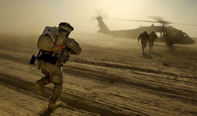 Soldiers walking dirt field helicopter #2 free wallpaper for desktop - medium preview image