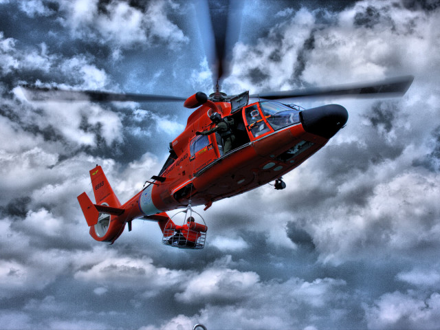 Red helicopter cloudy sky person free wallpaper for desktop - medium preview image