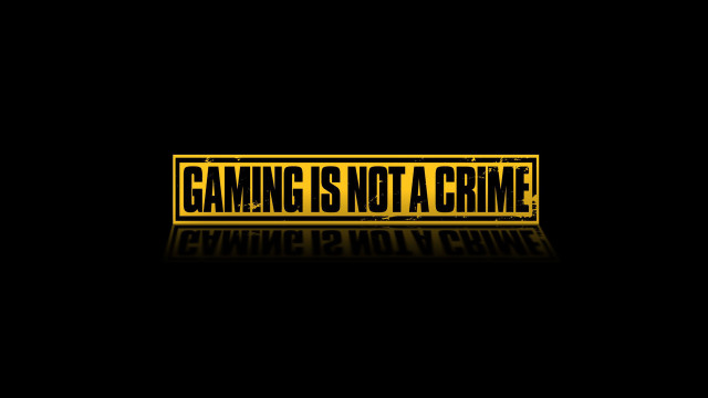 Gaming not crime warning yellow free wallpaper for desktop - medium preview image