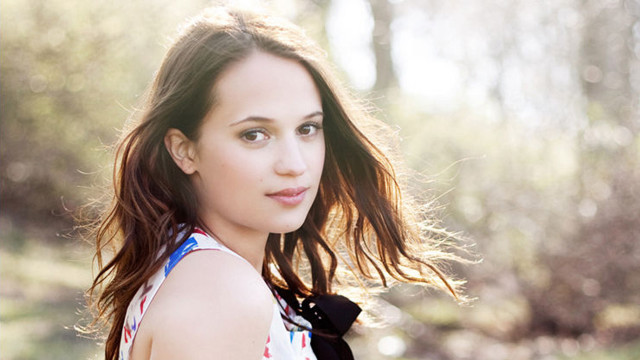 Woman backpack woods serious look free wallpaper for desktop - medium preview image