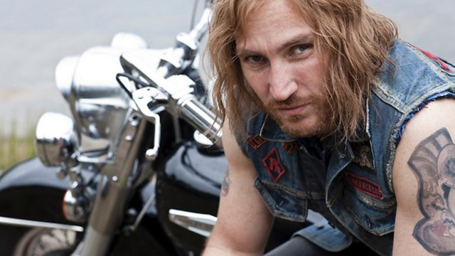 Man tattoo motorcycle bear leaning free wallpaper for desktop - medium preview image