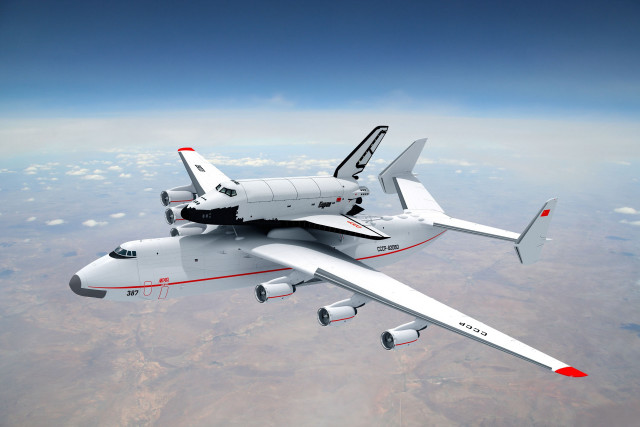 Large airplane flying sky cargo free wallpaper for desktop - medium preview image