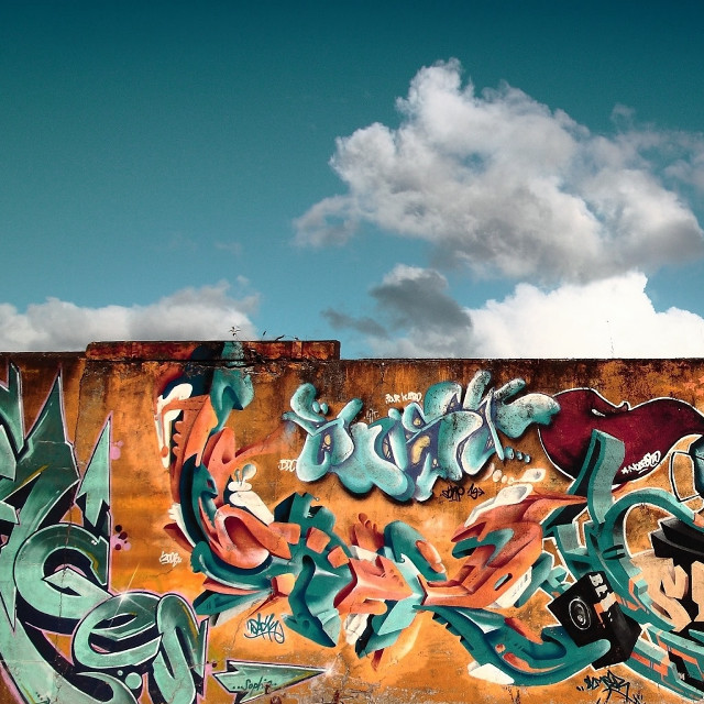 Graffiti wall sky background clouds #2 free wallpaper for tablet - medium preview image