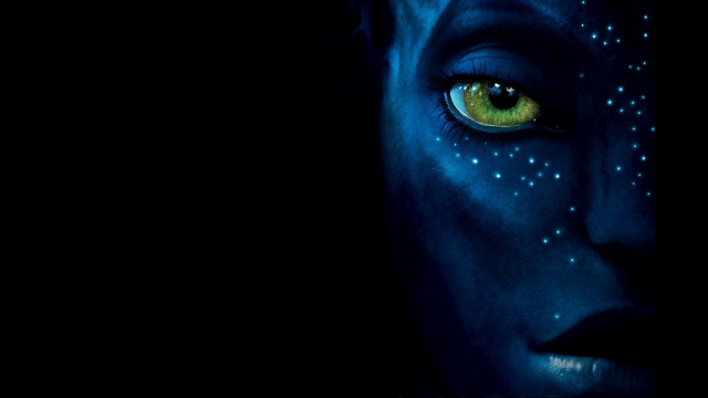 Woman blue makeup yellow eyes free wallpaper for desktop - medium preview image