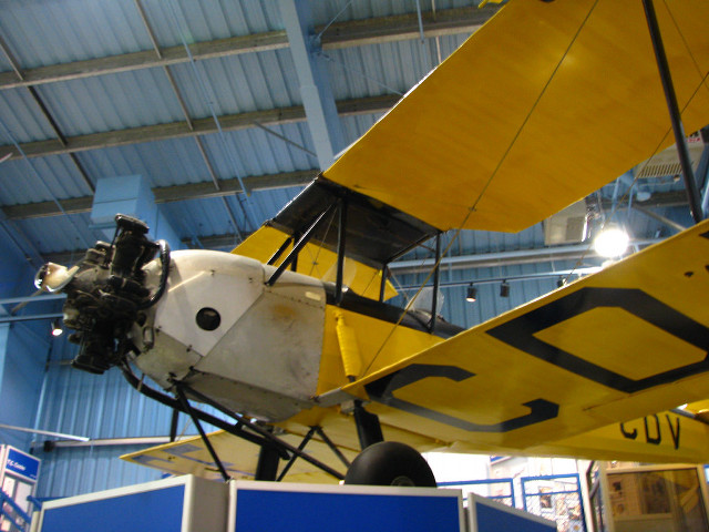 Yellow plane building blue ceiling free wallpaper for desktop - medium preview image