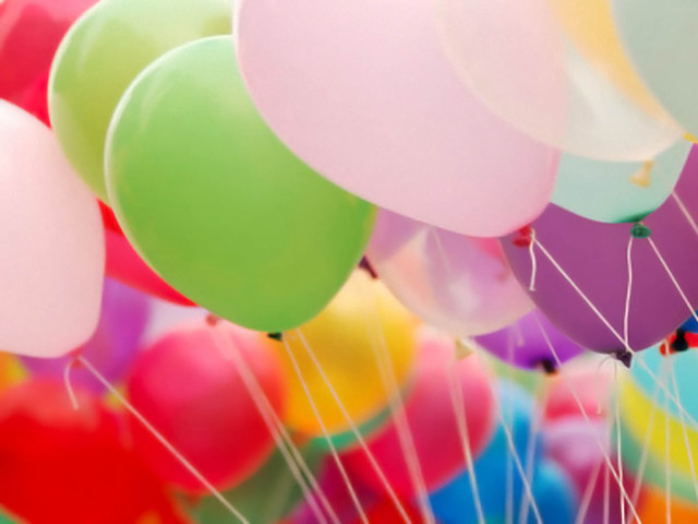 Balloons floating rainbow colored display free wallpaper for desktop - medium preview image